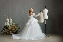 BOSTON – STRIKING OFF-THE-SHOULDER COMMUNION DRESS WITH RUFFLED FEATHER PEPLUM(Boston Striking Off The Shoulder Communion Dress With Ruffled Feather Peplum) -Mia Bambina Store mia bambina boutique boston striking off the shoulder communion dress with ruffled feather peplum 2