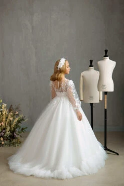 SARNIA – DELICATE COMMUNION DRESS WITH SHEER PUFF SLEEVES AND RUFFLED HEM(Sarnia Delicate Communion Dress With Sheer Puff Sleeves And Ruffled Hem) -Mia Bambina Store mia bambina boutique sarnia delicate communion dress with sheer puff sleeves and ruffled hem 3